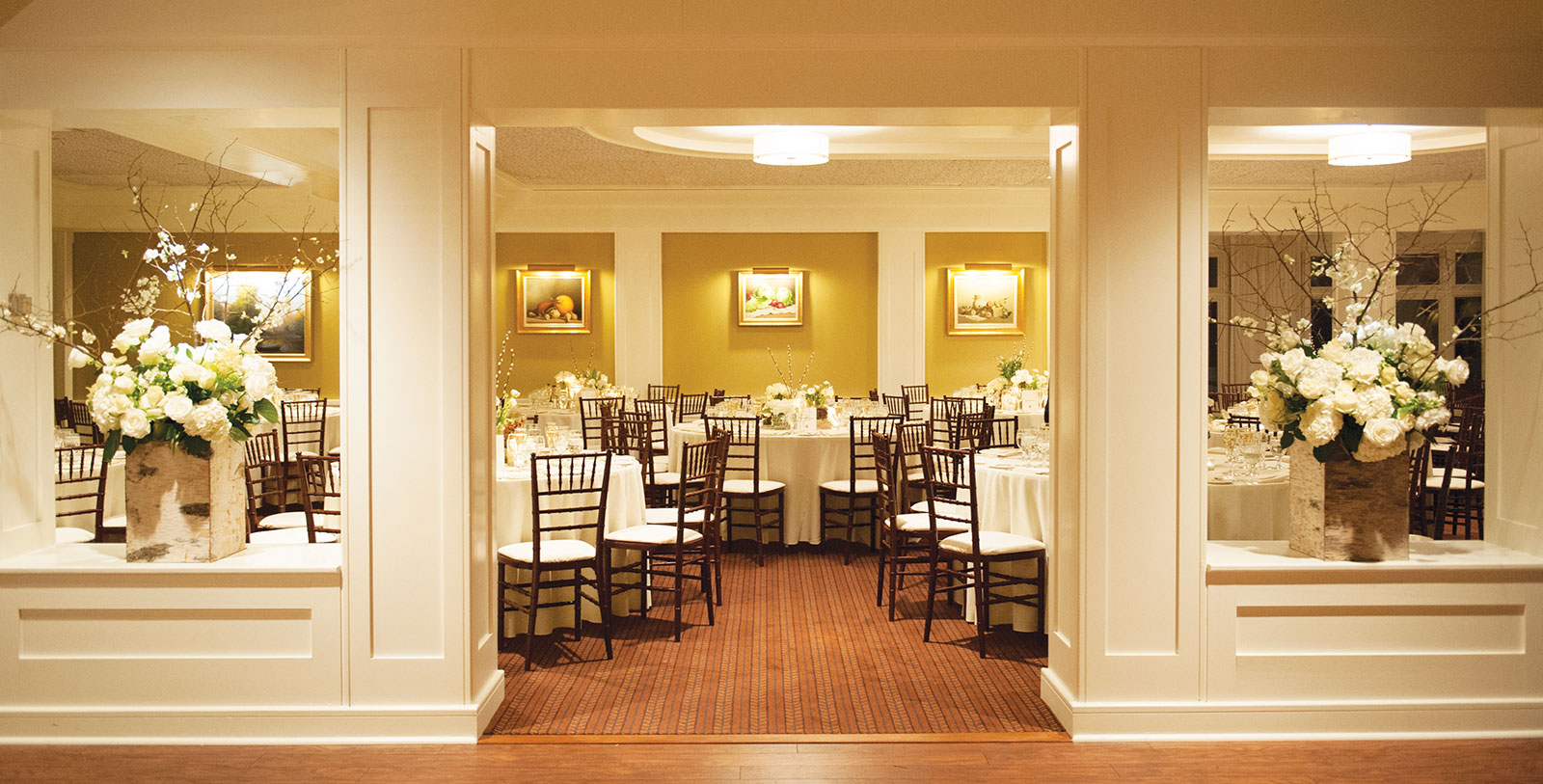 a room with tables and chairs