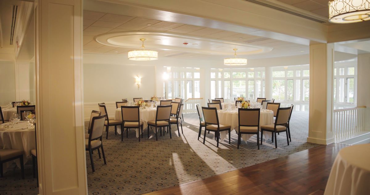 a room with tables and chairs