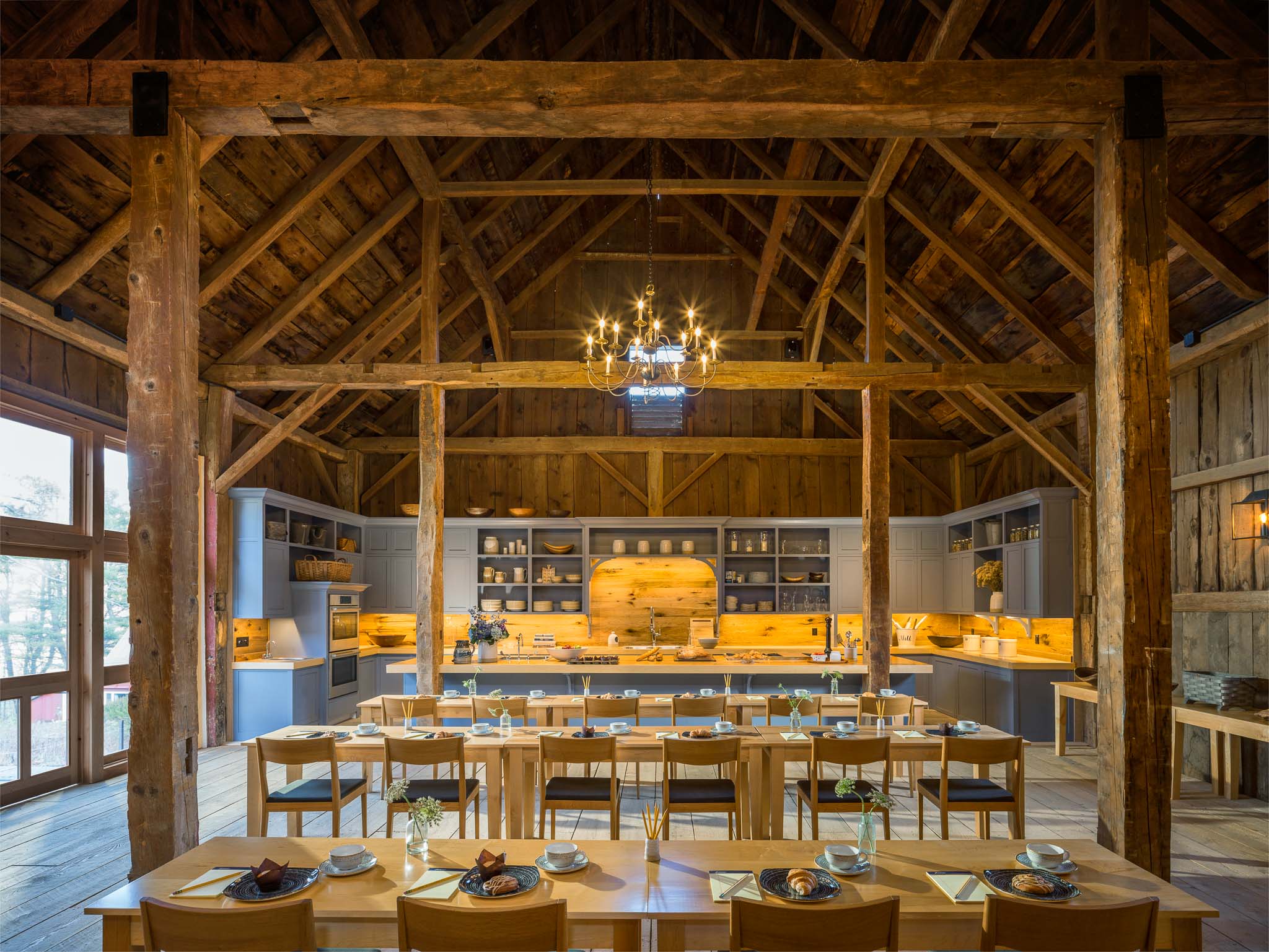 a room with a large table and chairs
