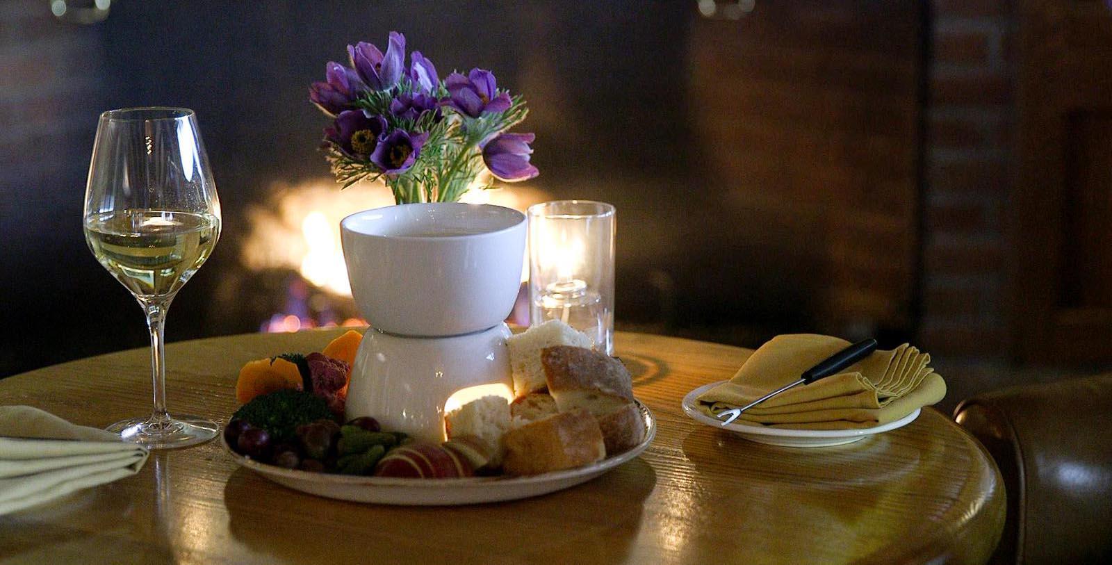 a plate of food and a candle on a table