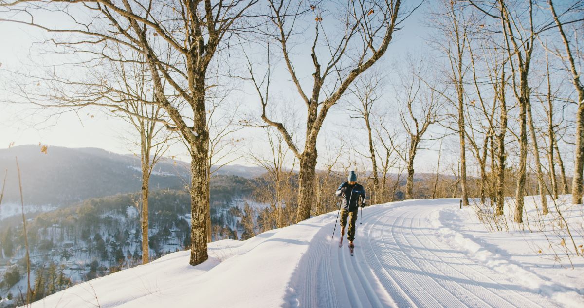 a person skiing down a snowy hill