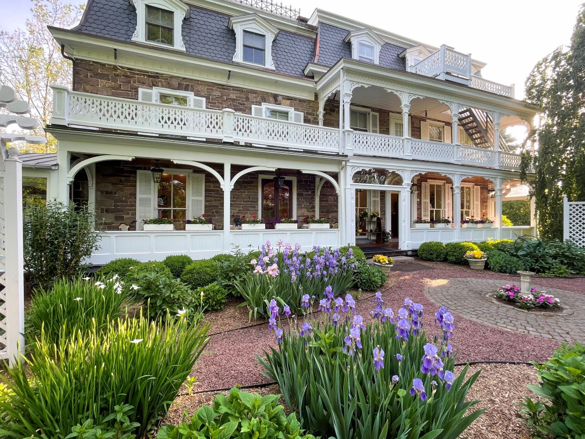 a large house with a garden