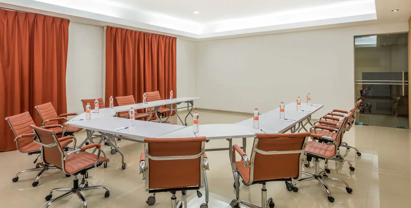 a conference room with chairs and tables