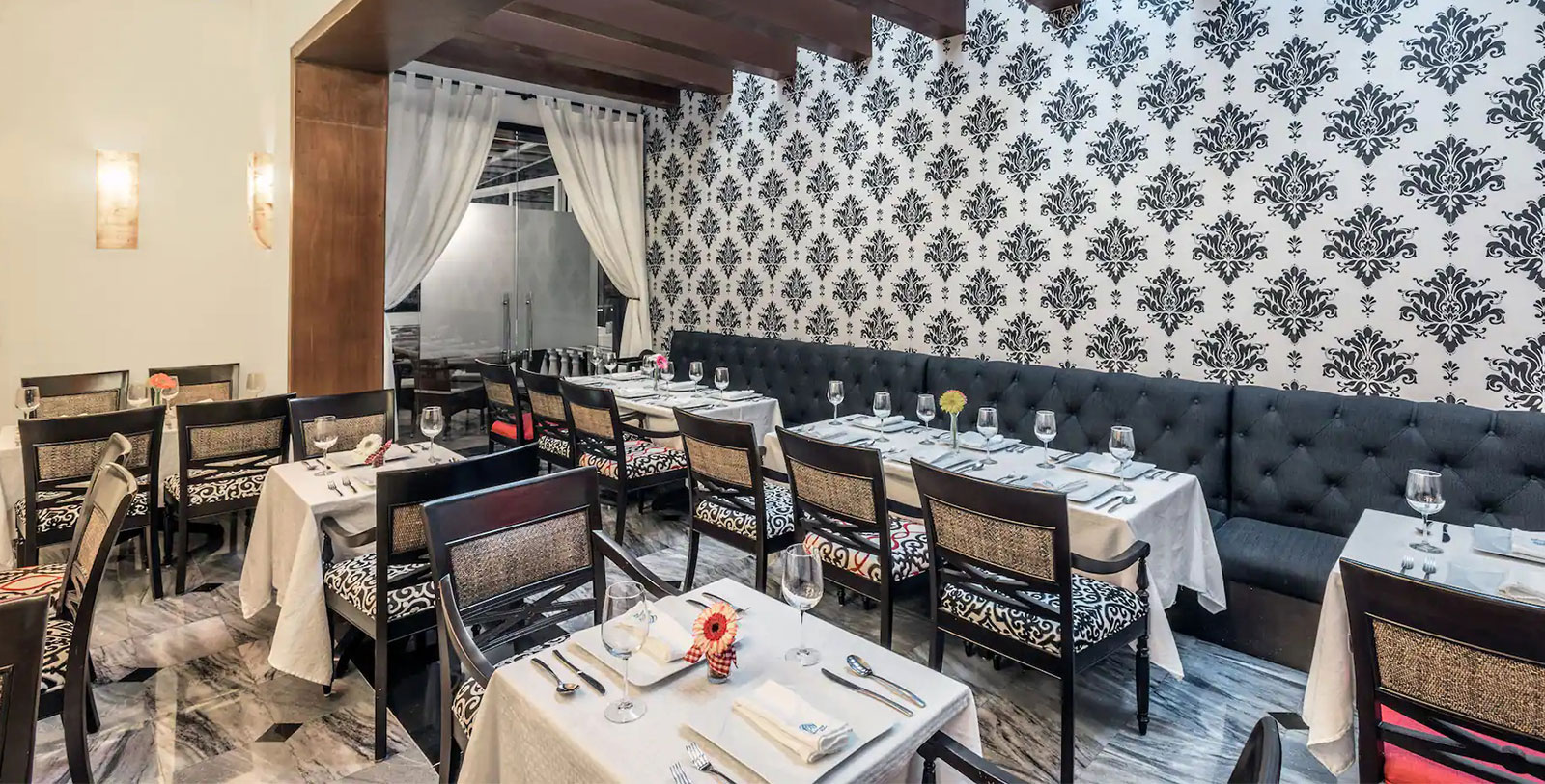 a restaurant with tables and chairs