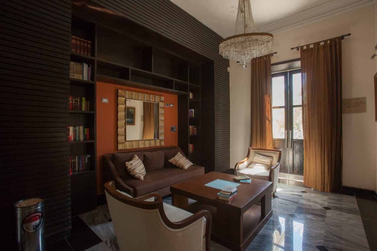 a room with a couch and a coffee table