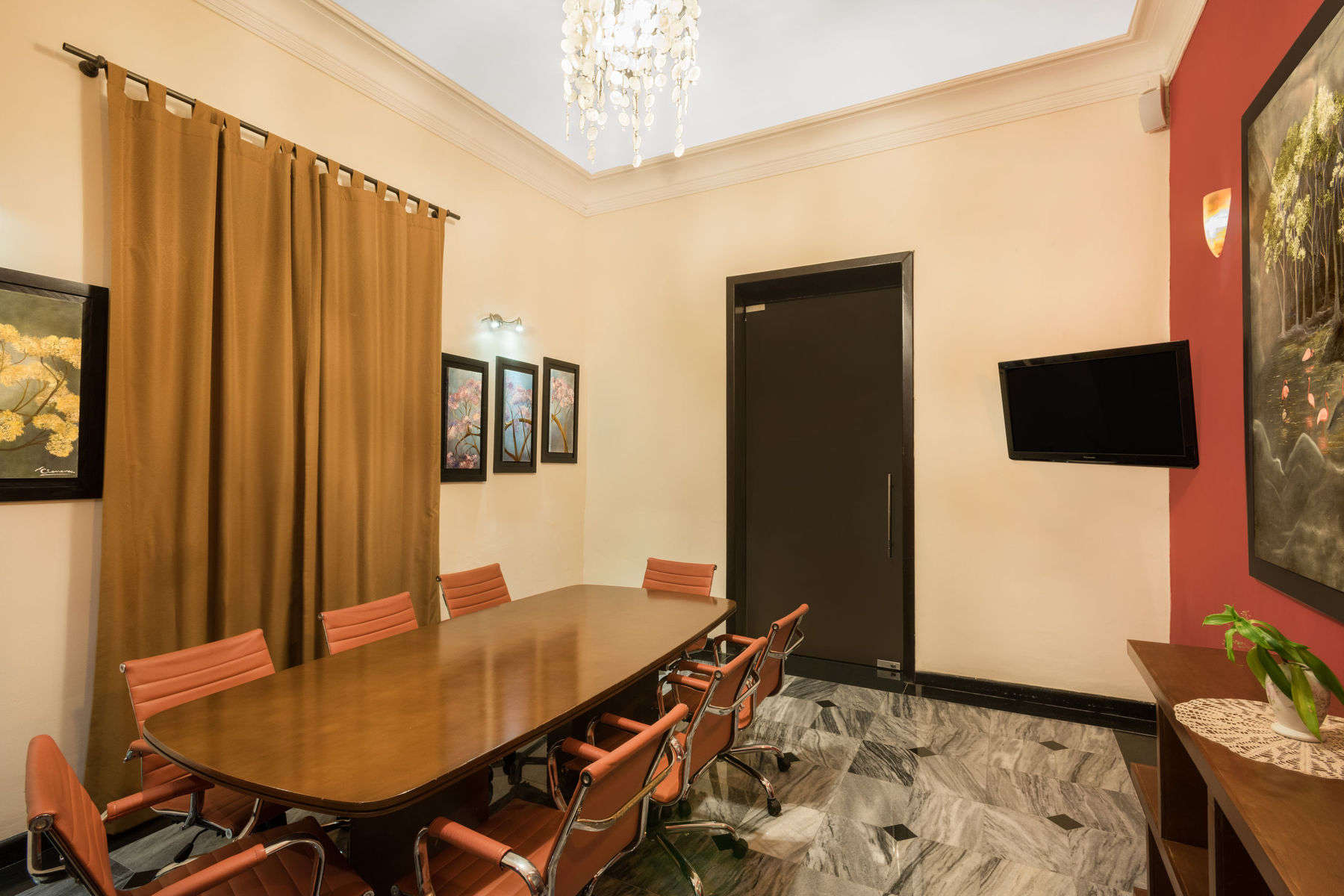 a room with a table and chairs