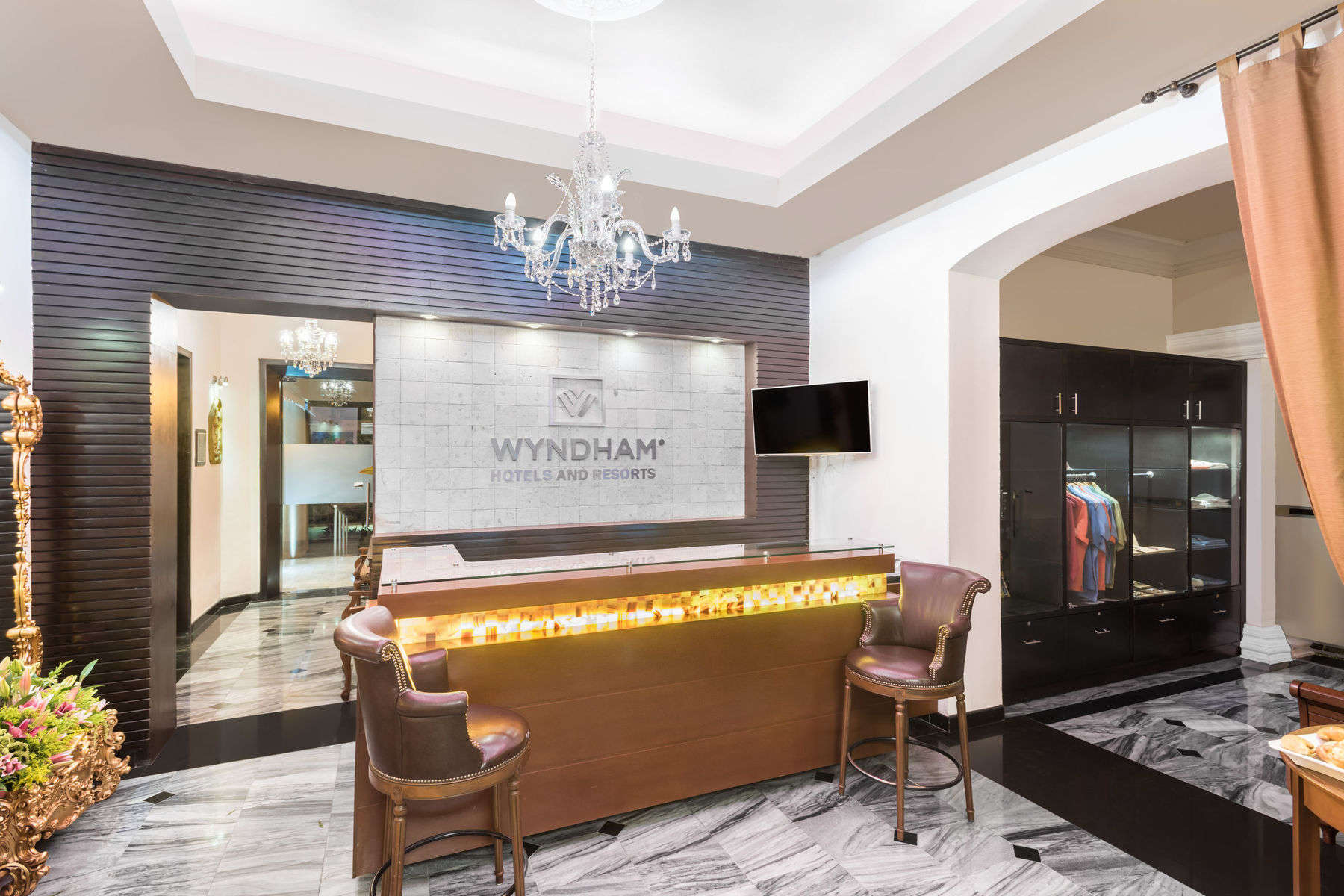 a reception desk in a hotel