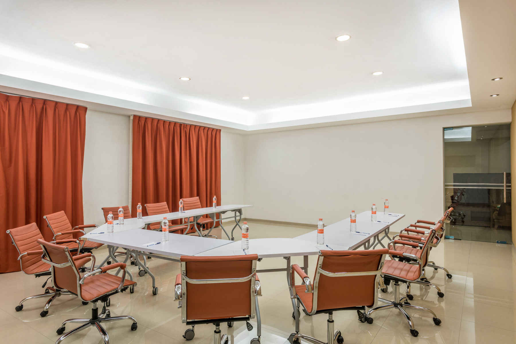 a room with tables and chairs