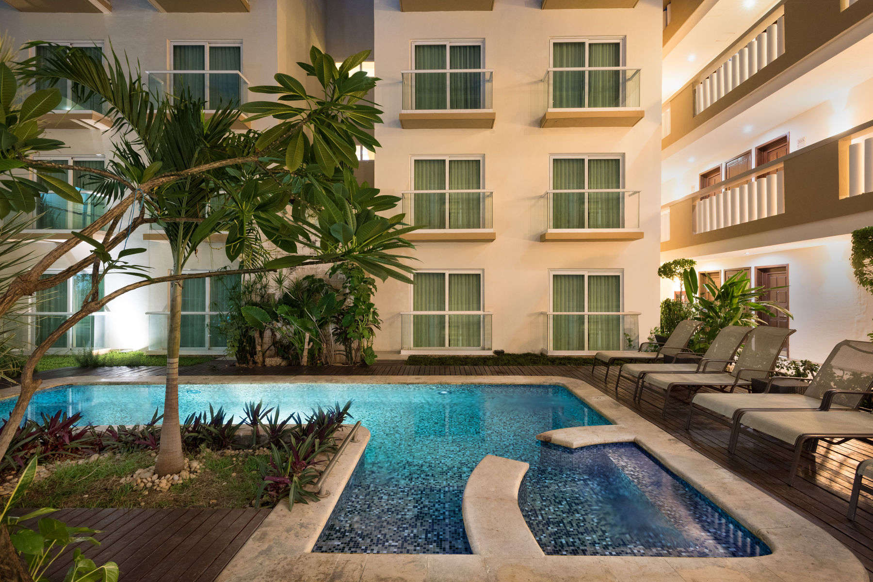 a pool in front of a building
