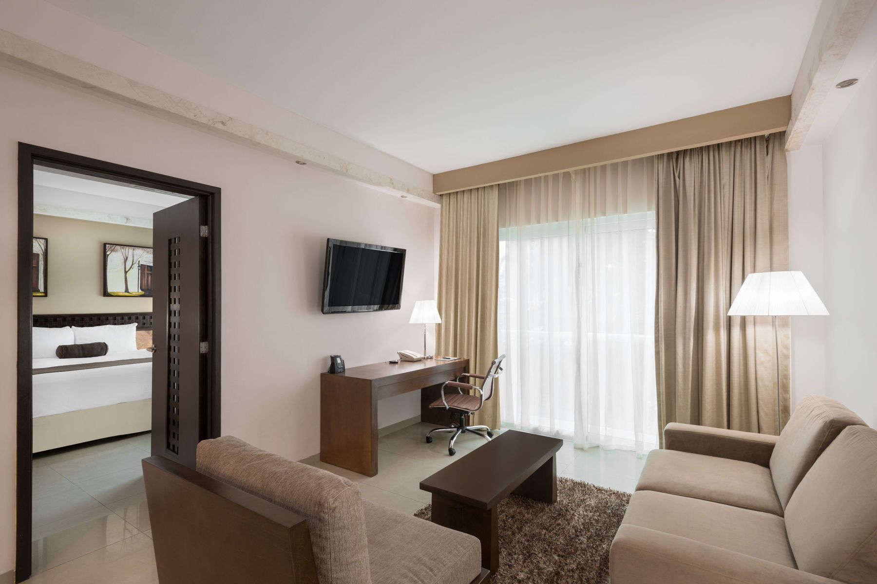 a room with a television and couches