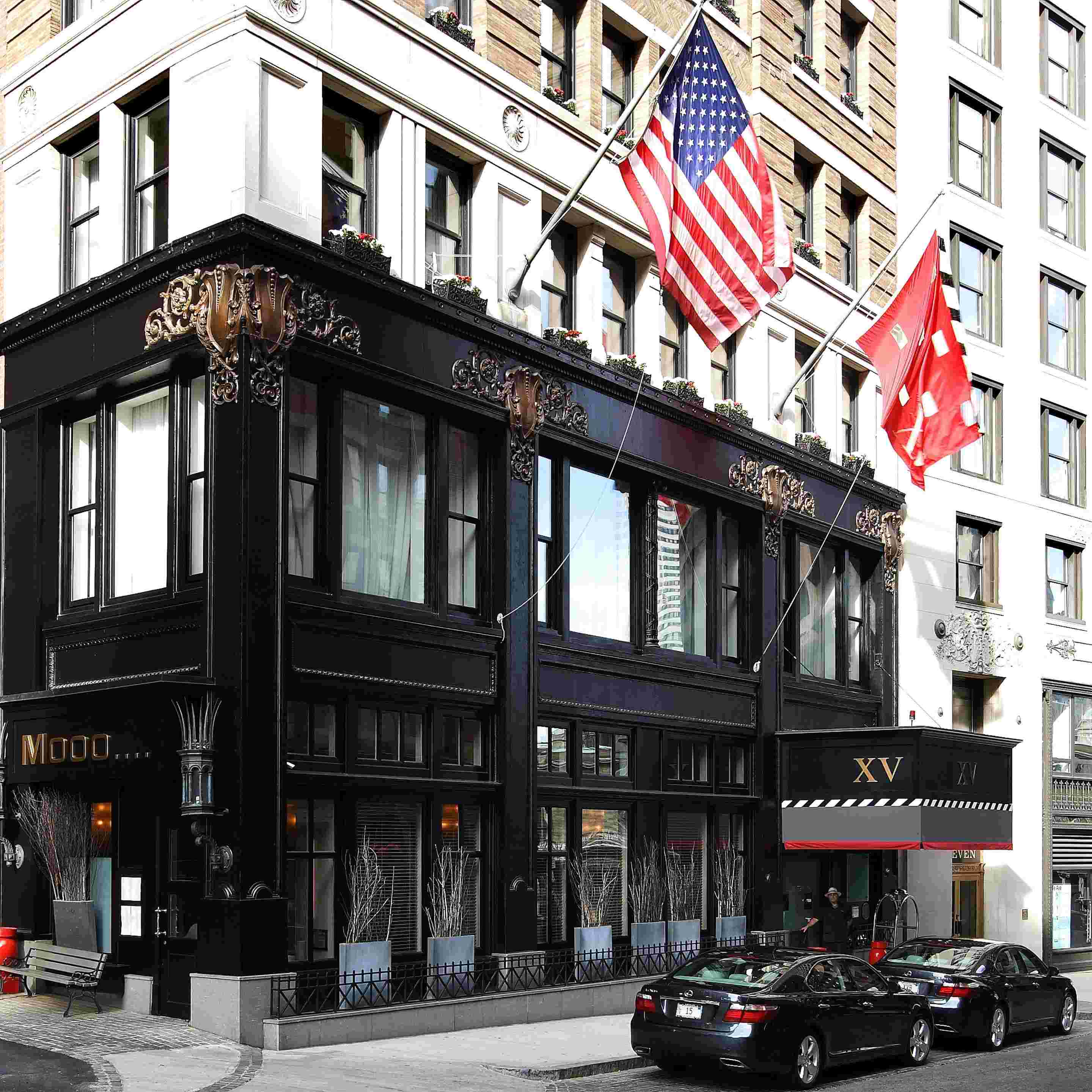 a building with flags on the side