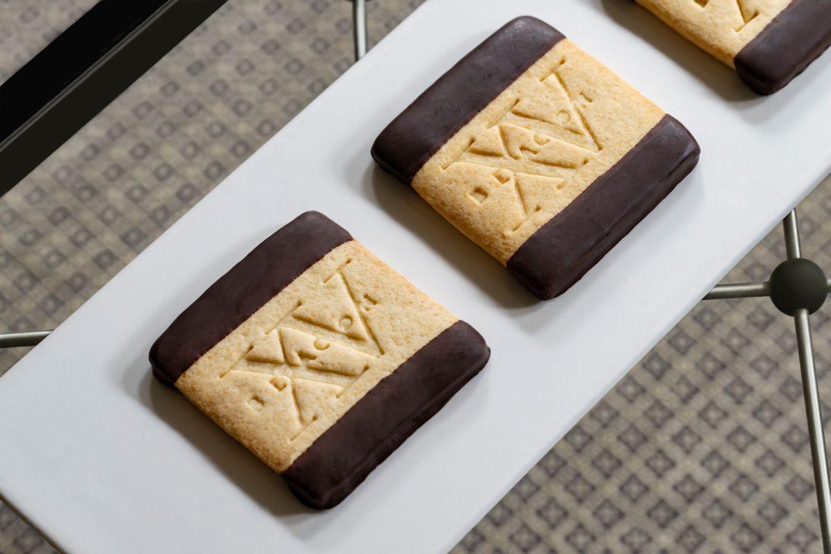 a group of cookies on a white plate