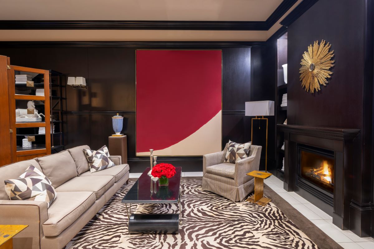 a living room with a fireplace and a couch
