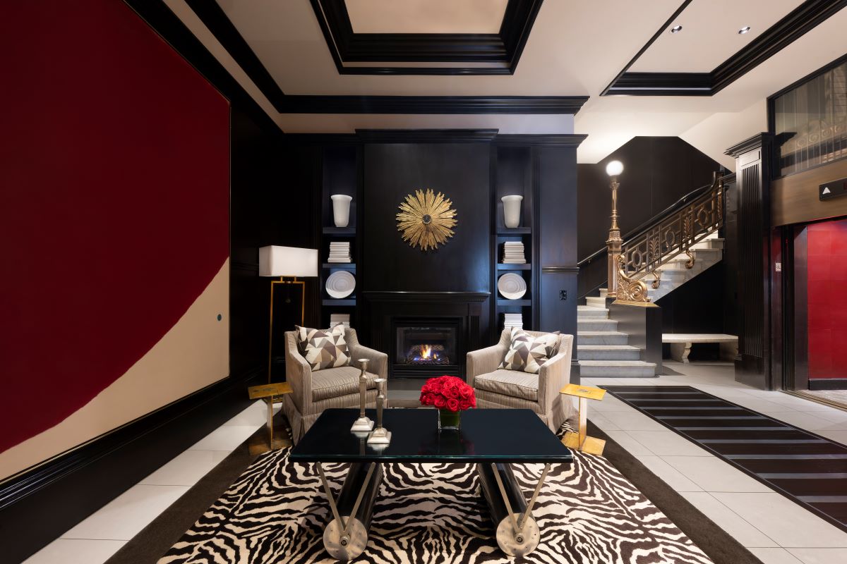 a room with a fireplace and a coffee table